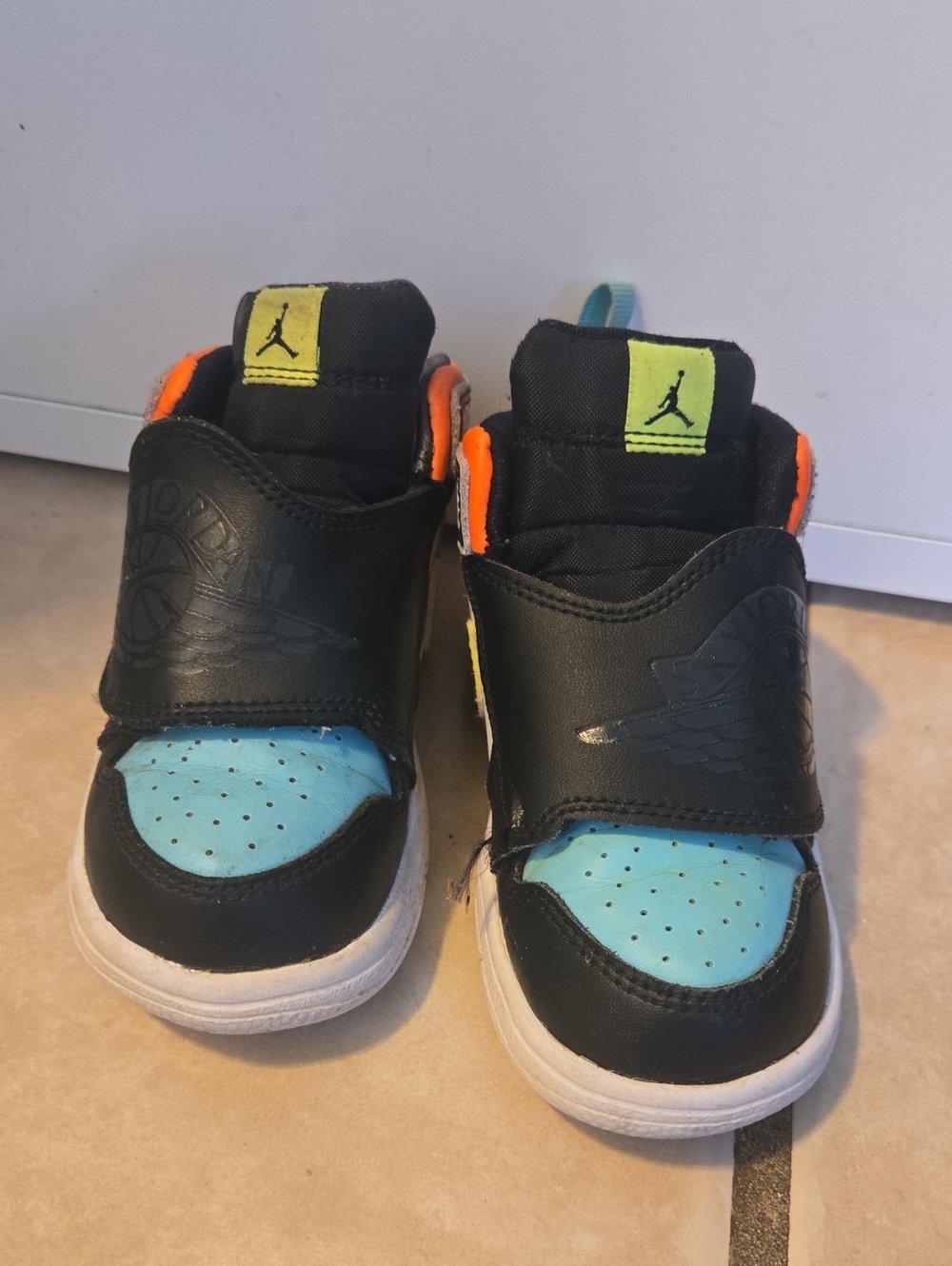 Jordan Kids Black and Light Blue High-Top Sneakers with Neon Accents